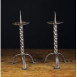 A Pair of Painted Wrought Iron Pricket Candlesticks in the early 17th century style.
