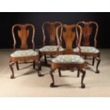 A Superb Set of Four George I Irish Walnut Chairs.