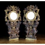 An Unusual Pair of Early 18th Century Pedestal Mirrors.