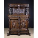 A Fine 17th Century Flemish Oak Cabinet with elaborate carving.