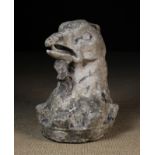 An Architectural Stone Carving of a Falcon's Head, 20 in (51 cm) in height.