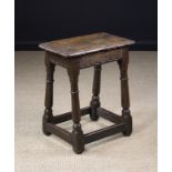 A 17th Century Oak Joint Stool.