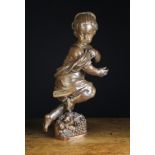A 17th Century Baroque Oak Carving of a Fleshy Cherubic Infant; her hair dressed in plaits,