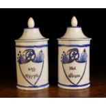 Two Blue and White Pharmacy Jars with finial knopped lids.