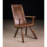 A Unusual 18th Century Primitive Ash and Fruitwood Armchair.