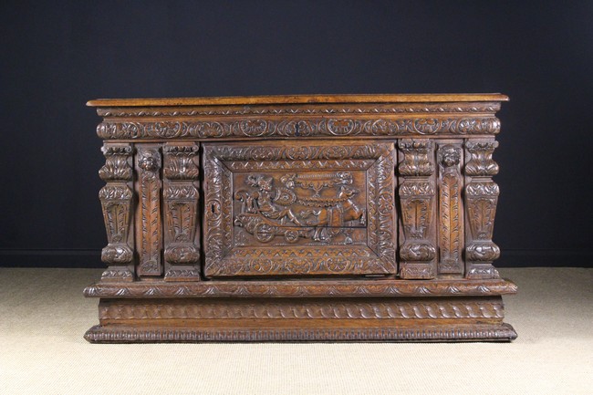 A 17th Century Carved Oak Coffer Front.