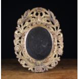 A Small Late 18th Century Carved Giltwood Wall Mirror.