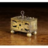 A 17th Century Miniature Nuremberg Brass Casket pierced and engraved with decoration and standing