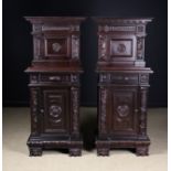 A Pair of French Neo-Renaissance Style Side Cabinets carved with a frieze band of overlapped scales