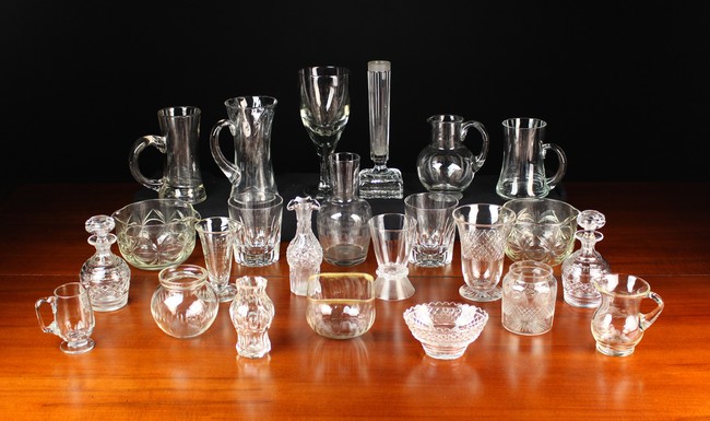 An Assortment of Glassware to include a large goblet vase, a pair of cut glass rinsers,