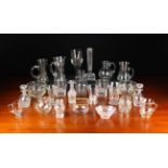 An Assortment of Glassware to include a large goblet vase, a pair of cut glass rinsers,