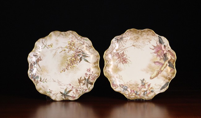 A Pair of Doulton Burslem 'Mona' Plates with scalloped rims, printed in sepia with wisteria,