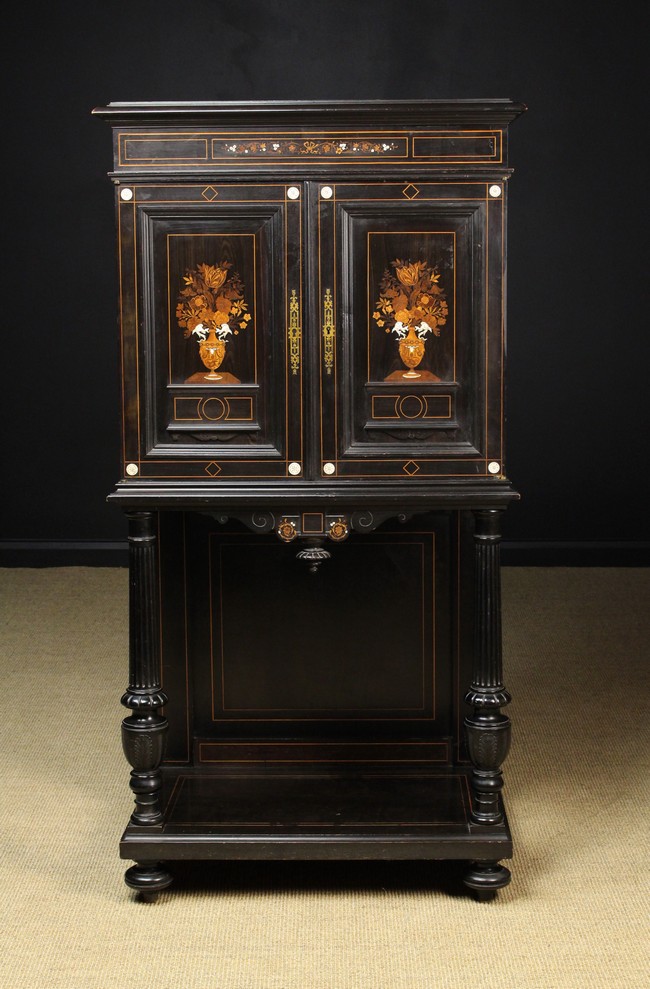 An Attractive 19th Century Inlaid Ebony Cabinet of fine quality.