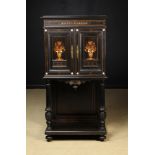 An Attractive 19th Century Inlaid Ebony Cabinet of fine quality.