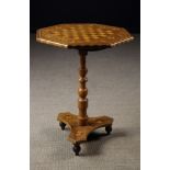 A 19th Century American Inlaid Maple & Boxwood Tilt-top Games Table.