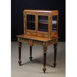 A Louis XVI Style Inlaid Table à Écrire. The diagonal grained veneers inlaid with interlaced bands.