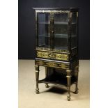 A Small & Elegant Late 19th Century Ebonised Rosewood Cabinet decorated with elaborate brass inlay.