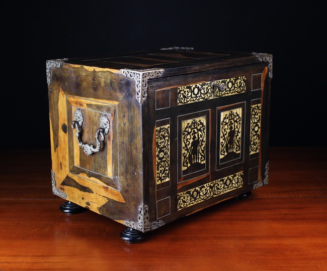 A 17th Century Italian Inlaid Collectors Cabinet clad in coromandel veneers and embellished with