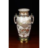 A Japanese Satsuma Vase decorated with finely detailed fans enriched with gilding,