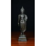 An Elegant Antique Bronze Buddhistic Figure, 17¾ in (45 cm) in height.