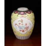 A Chinese Ovoid Jar decorated in polychrome enamels with vases of flowers in petalled panels either