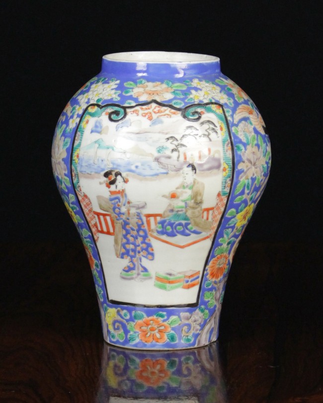 A Chinese Rising Baluster Vase decorated in polychrome enamels with figural panels, birds,