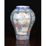A Chinese Rising Baluster Vase decorated in polychrome enamels with figural panels, birds,