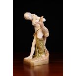 A Royal Worcester Figure of 'Bather Surprised' after a model by Sir Thomas Brock.