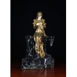 A Fine Gilt Bronze & Carved Ivory Statue of a lady in medieval style attire with long platted hair,