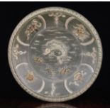 A Large Oriental Moulded Stoneware Platter decorated with a leaping carp to the centre and motifs