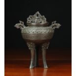 A 19th Century Bronze Koro with pierced lid, decoratively cast sides,