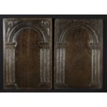 A Pair of James I Arcaded Oak Panels with incised decoration,