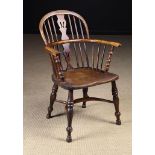 A 19th Century Yew & Elm Low-backed Windsor Armchair.