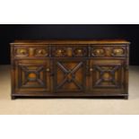 A Late 17th/Early 18th Century Oak Enclosed Dresser with decorative geometric moulding,
