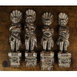 A Set of Four Small 17th Century Flemish Carved Oak Figural Appliqués.