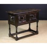 A Unusual Free-Standing Joined Oak Livery Table having 16th Century relief carved panels to each