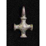 An Early Viking Bronze and Gilt Cross of Diminutive Proportions. Measuring approx 1 inch (2.