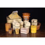 A Collection of Vintage Containers: To include a set of five lidded tin canisters with knop handles