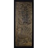 A 15th/16th Century Gothic Oak Fragment Panel carved in relief with a Chimera below a pair of