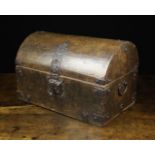A 17th Century Spanish Dome-topped Wooden Casket bound in decoratively pierced iron straps with an