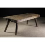 An Antique Rustic Pig Bench.