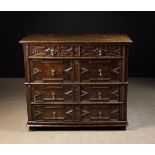 A Large Late 17th Century Oak Chest of Drawers in two sections.