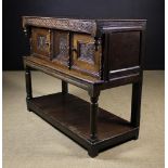A 17th Century & Later Carved Oak Buffet/Livery Cupboard.