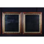 A Pair of 18th Century Italian Wall Mirrors of rectangular form set in painted frames carved with