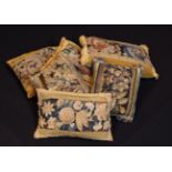 Six Scatter Cushions with fragment panels of late 17th/early 18th century foliate tapestry stitched