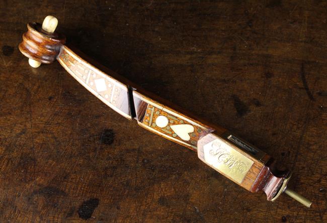 A Fine Quality 19th Century Inlaid Oak Knitting Sheath with scrolled end,