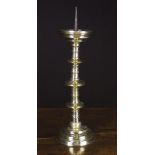 A Large 16th Century Bronze Pricket Candlestick with fillet knopped cylindrical stem,