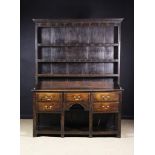 An 18th Century Dresser with Rack.