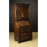 An Early 18th Century Oak Bureau Bookcase.