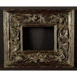 A Small 19th Century Oak Frame carved with an undulatin gtrai of trail between moulded borders,